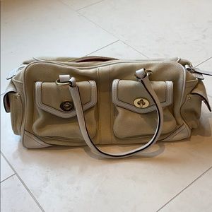 Coach tan and white canvas purse.